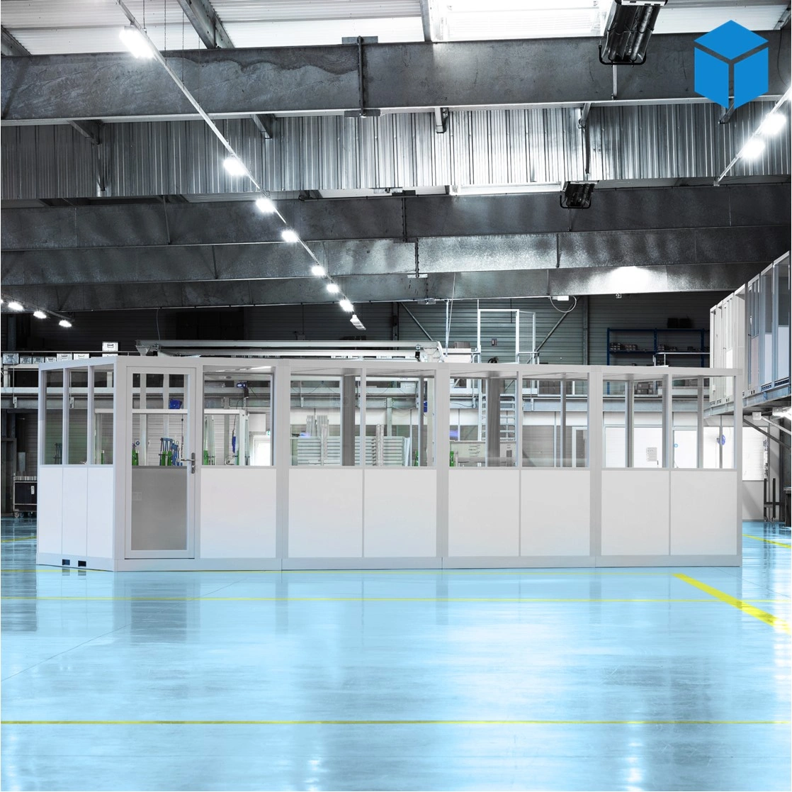 Cabine d’atelier palettisable 8x3m finition blanche en environnement logistique